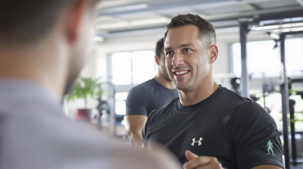Man smiling in gym